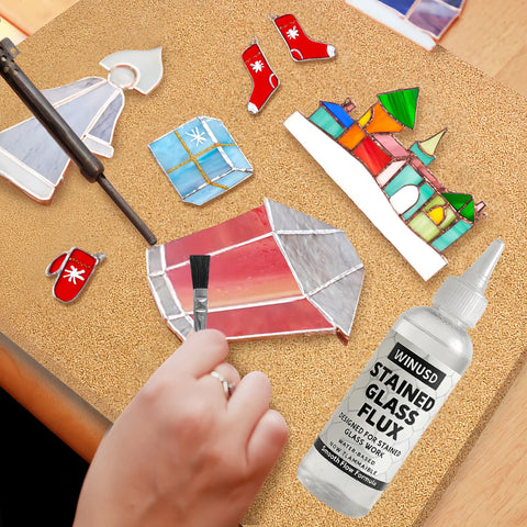 4oz Liquid Zinc Solder Flux for stained glass soldering projects, bottle with brush, stained glass art pieces displayed