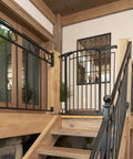 Multi-Use Tall Walk-Thru Baby Gate In Black Metal at top of stairs, pressure or hardware mount, adjustable width, 36 inch tall