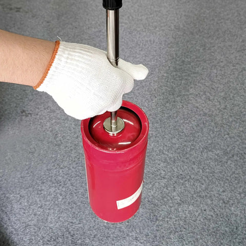 Retractable Magnetic Pickup Tool With 35 Lb Suction Extends Up To 41 Inches for HardToReach Corners in use lifting metal object