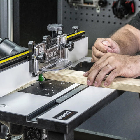 Heavy Duty Portable Benchtop Router Table Featuring A Rock Solid Steel Frame 24 By 16 Inch laminated work surface in use with wood.