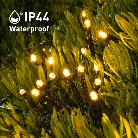 2 Pack Solar String Lights Outdoor Waterproof 400 LED 151 Ft Total Warm White 8 Modes in garden during rain
