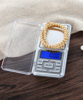 Compact Digital Pocket Scale With 500G Capacity And 0.01G Precision In A Stainless Steel Panel Easy To Read LCD Display with beads