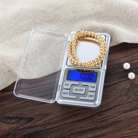 Compact Digital Pocket Scale With 500G Capacity And 0.01G Precision In A Stainless Steel Panel Easy To Read LCD Display with beads