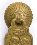 Close-up of Ru Yi solid brass pull from Brass Buddha Scepter Cabinet Pulls 2.4 Inch Set Of 2 For Furniture And Cabinetry Architectural Interior Design Hardware Solid Brass Drawer Pulls With Washer Set Ru Yi Style Accent For Custom Homes, showing intricate design and washer.