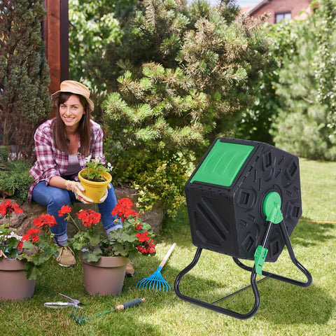 Compost Tumbler Bin With Sliding Doors, 18.5 Gallon Rotating Chamber, Portable Outdoor Garden Compost Bin next to gardener