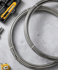 Two MorningRo 3/8 in x 50 ft 304 stainless steel tubing coils with tools nearby