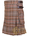 Mens Utility Kilt Showcasing Iconic MacKenzie Weathered Tartan Pattern Tailored From Comfy Acrylic Wool Blend Finished With Rugged Leather Fasteners For Kickback Vibes, featuring leather straps and pocket.