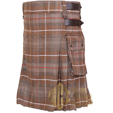 Mens Utility Kilt Showcasing Iconic MacKenzie Weathered Tartan Pattern Tailored From Comfy Acrylic Wool Blend Finished With Rugged Leather Fasteners For Kickback Vibes, featuring leather straps and pocket.