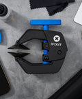 Pro Grade Anti Clamp Opening Tool For Phones And Tablets With Dual Suction Cups And Adjustable Opening Force For Safe Adhesive Removal And Gentle Glass Screen Separation No Fuss displayed on a surface with tools