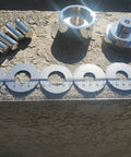 Coin Ring Puncher And Spacer Set For DIY Jewelry Making 5 Punch Tool displayed with punches and spacers on a table.