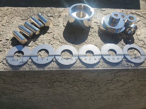 Coin Ring Puncher And Spacer Set For DIY Jewelry Making 5 Punch Tool displayed with punches and spacers on a table.
