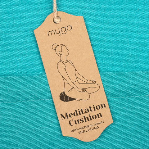 Zafu Yoga Meditation Cushion With Washable Cover And Buckwheat Filling Soft Round Cotton Floor Pillow For Meditation Pranayama And Stress Relief Turquoise Color Cozy Ergonomic Vibe For Home Studio Or Yoga Room. Tag on turquoise fabric.