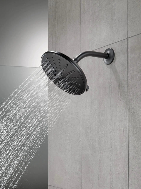 3 Spray H2Okinetic Shower Head With Touch Clean In Matte Black Delivers 3X Coverage And PowerDrench Spray For A Spa Like Full Body Shower Experience Everyday installed on tile wall