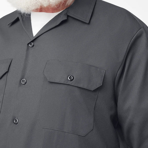 Men's Long Sleeve Work Shirt Charcoal Relaxed Fit Button Front With Twin Chest Pockets Built Like A Tank Cotton Poly Blend Wrinkle Resistant Finish For The Daily Grind close-up showing button flap pockets and shirt texture.