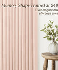 Light Pink Linen Curtains 108 Inch Long, 2 Panels, Pinch Pleat, Semi Sheer Light Filtering For Nursery Baby Girls Bedroom, Dusty Blush Drapes, 350GSM Linen Blend For Living Room Cozy Modern Drapes installed with a potted plant on a stool nearby.