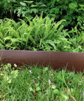 DIY Friendly 20Ft Plastic Garden Edging Kit With 25 Stakes Four Point Five Inch Tall Lawn Border installed in garden