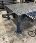 Built Tough 12 Inch Welding Clamping Square And Table Extension Kit Featuring Precision Machined 90 Degree Positioning Riser Blocks on modular fixture table.