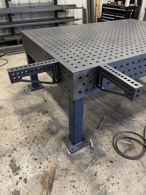 Built Tough 12 Inch Welding Clamping Square And Table Extension Kit Featuring Precision Machined 90 Degree Positioning Riser Blocks on modular fixture table.