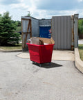 Commercial 16 Bushel Utility Cart With Steel Base And Poly Box Basket, Rolling Laundry Cart And Trash Bin, 1000 Pound Weight Capacity, Workhorse Cart For Offices, Warehouses, And Restaurants, Red in use outdoors.