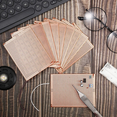 Ten Pack 73mm By 100mm Protoboard Kit With Copper Strip Boards 957 Holes for DIY Electronics on Desk