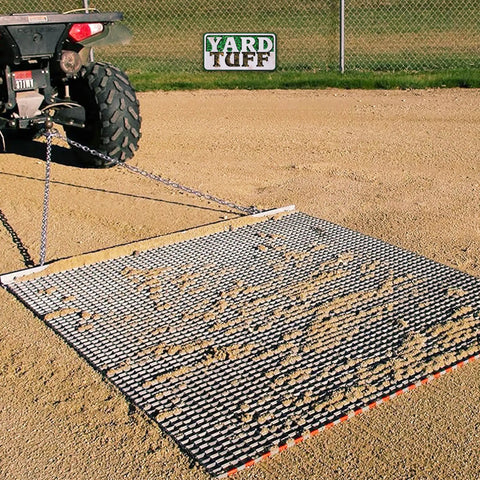 Heavy Duty Zinc And Steel Mesh Field Drag Mat For Surface Leveling with tow chain attached to vehicle on sandy field