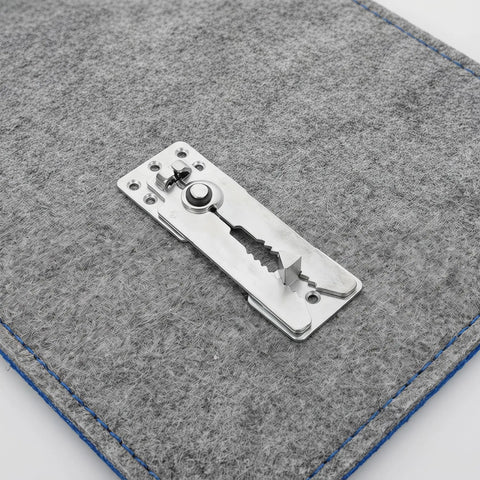 Close-up of a Top Shelf Stainless Steel Sectional Couch Connector Built Tough With Anti Slip Grip on gray fabric surface.