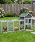 Spacious Wooden Chicken Coop And Rabbit Hutch For Outdoors With Nesting Box, waterproof roof, and sliding door in backyard