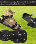 Lawn Aerator Shoes With Spike Tines for Easy Soil Aeration on grass, showing adjustable three strap buckle and durable plates.