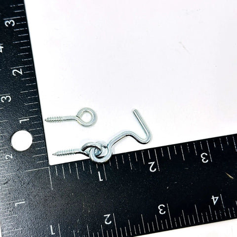 No Nonsense Heavy Duty Gate Hook And Eye Set With Dual Threaded Eyes Slick For Barn Doors Fence Closures And Cabinet Latches Built Tough With Durable Zinc Plated Steel Finish on ruler.