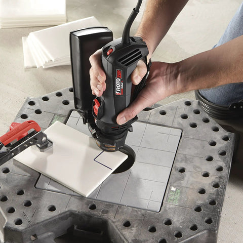User operating the Badass Job Site Ready 6 Amp Roto Spiral Saw Kit With Variable Speed 15000 To 30000 Rpm on tile.