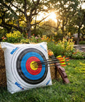 Beast-Size Outdoor Archery Target Bag 36 By 30 By 11 Inches, high-density fill with arrows on grass in a garden setting