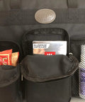 Front view of black New Improved Travel Bag Case for Nespresso Essenza Mini and Pixie with pockets holding items.