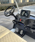Interior view of the Rock Solid 6 Seater Electric Golf Cart With 48V Lithium Battery And 14 Inch Off Road Tires showing dashboard and seating.