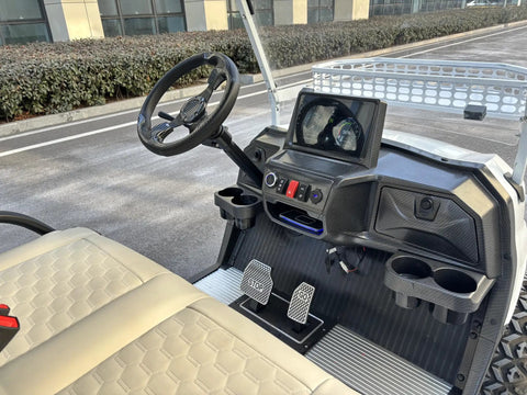 Interior view of the Rock Solid 6 Seater Electric Golf Cart With 48V Lithium Battery And 14 Inch Off Road Tires showing dashboard and seating.