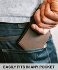 Man placing RFID Blocking Leather Wallet For Men With Extra Capacity Bifold Design into jeans pocket for easy carry.