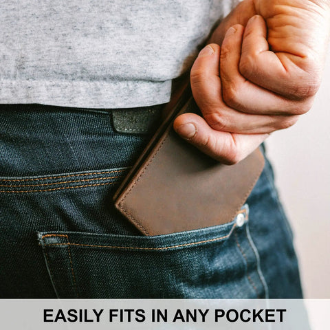 Man placing RFID Blocking Leather Wallet For Men With Extra Capacity Bifold Design into jeans pocket for easy carry.