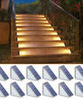 Solar Step Lights 12 Pack Warm White Auto On Off Outdoor IP67 Waterproof for Stairs Patios Yards showcasing warm illumination