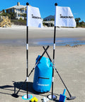 Beach Side Golf Set For The Sand With Two Adjustable Putters Waterproof Dry Bag Flags Cups Balls Sand Scoop And More For Family Fun On The Beach Game On This Summer displayed on sand