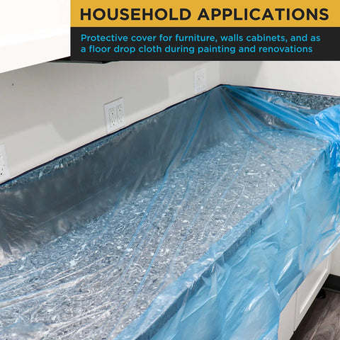 Blue Pre Taped Masking Film 71 Inch By 65 Foot Three Pack Drop Sheet With Built In Tape covering a kitchen countertop