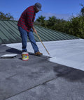 Person applying Liquid Rubber Coating Sealant For Waterproof, Flexible Protection On Roofs, Basements, RVs, Campers, Trailers, Marine Surfaces And Masonry White One Gallon With UV Resistant Breathable Finish And Easy Brush Or Pour Application to roof.