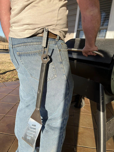 Person using Universal Tool Holder Belt Hook For Cordless Drills Saws And More Left Or Right Hand Use Durable Tool Holster Made In The USA
