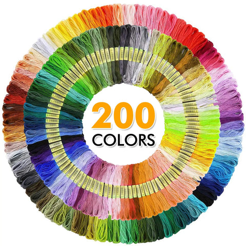 Embroidery threads in 200 colors from 304 Pack Embroidery Starter Kit With 200 Color Floss 5 Bamboo Embroidery Hoops 2 Aida Cloths Easy Instructions Bag And Cross Stitch Tools Set For Beginners And Adults arranged in a circle.