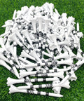 Skull And Crossbones Golf Tees, 3 1/4 Inch Plastic Tees With Black Stripes, Durable 6 Prong Cup, 100 Tees Bulk In Clear Bag on grass
