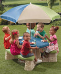 Six toddlers seated at the Naturally Playful Kids Picnic Table With Removable Umbrella For Indoor And Outdoor Use, Blue And Green
