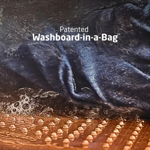 Close-up of Compact Travel Laundry Washbag featuring Patented Flex Washboard design in use with water and fabric.