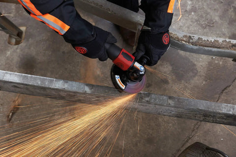 Straight From The Shop Floor Heavy Duty 4.5 Inch Air Angle Grinder Dumping A Massive 12000 Rpm cutting metal with sparks.