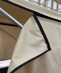 Close-up of removable zippered side curtains on Beige Canoe And Kayak Sun Shade Canopy Bimini Top In Conestoga Wagon Style.