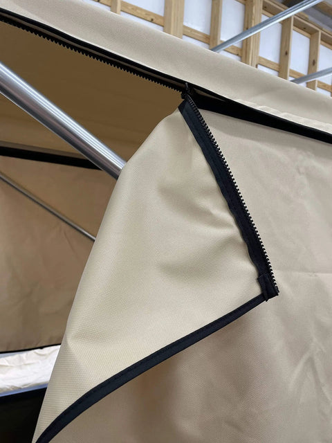 Close-up of removable zippered side curtains on Beige Canoe And Kayak Sun Shade Canopy Bimini Top In Conestoga Wagon Style.