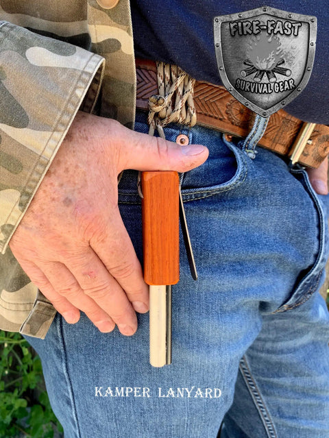 Compact European Fire Steel Ferro Rod With Magnesium On A Durable Lanyard ready for outdoor use on a person's belt
