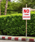 No Turn Around Sign Reflective Aluminum, Keeps Ya Seen In Darkness, Driveway Dead End Safety Marker, mounted on a pole near bushes.